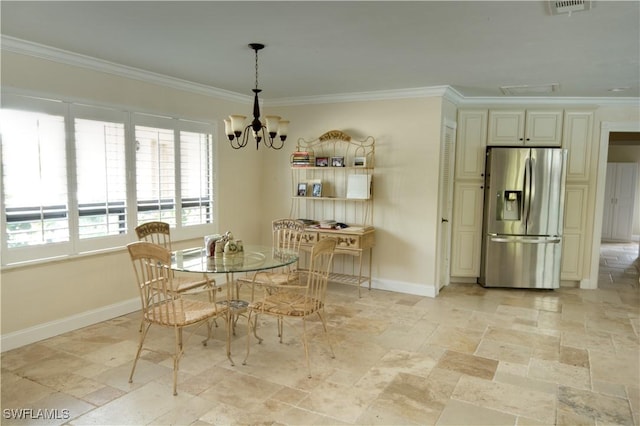 dining space with crown molding and a notable chandelier