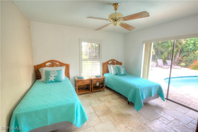 bedroom featuring access to outside and ceiling fan