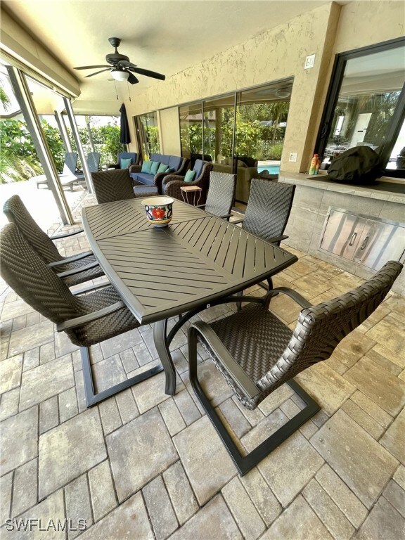 view of patio featuring ceiling fan and an outdoor hangout area