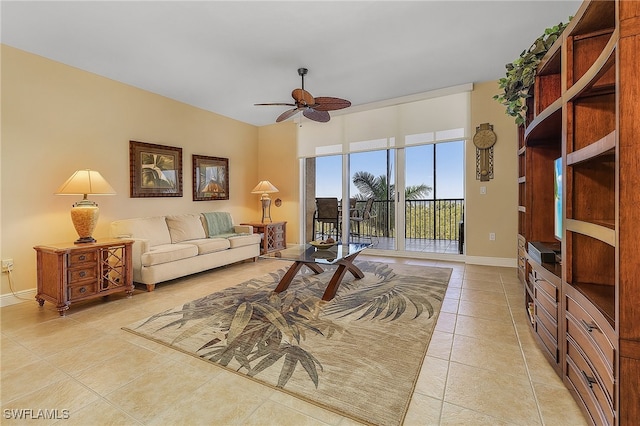 living room with light tile patterned floors and ceiling fan