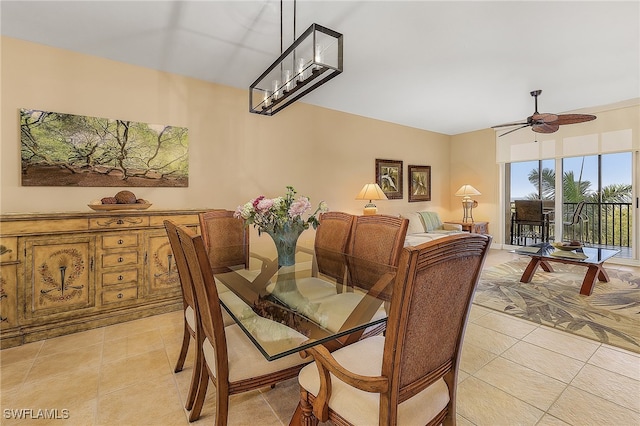 tiled dining room with ceiling fan