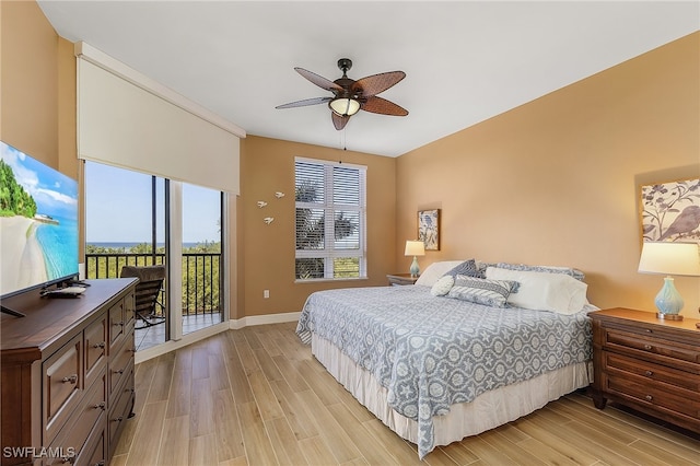 bedroom with ceiling fan, light hardwood / wood-style floors, and access to outside