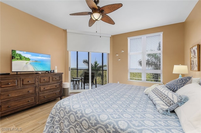 bedroom with ceiling fan, access to exterior, and light hardwood / wood-style flooring