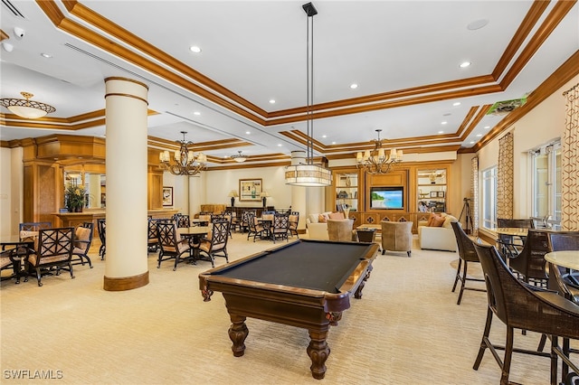 recreation room featuring light carpet, a tray ceiling, an inviting chandelier, and ornate columns