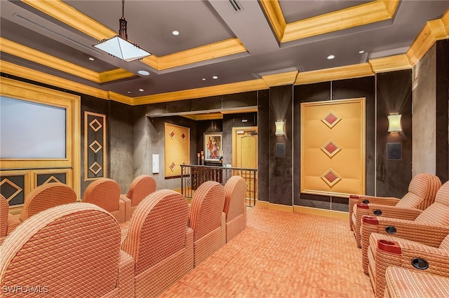 home theater room with ornamental molding