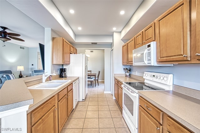 kitchen with ceiling fan, sink, light tile patterned floors, and white appliances