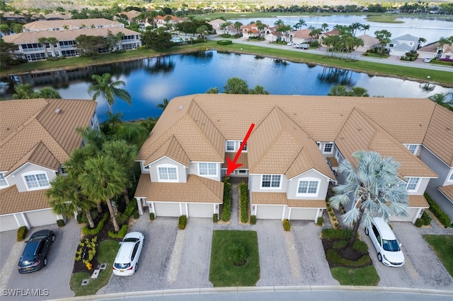 bird's eye view with a water view