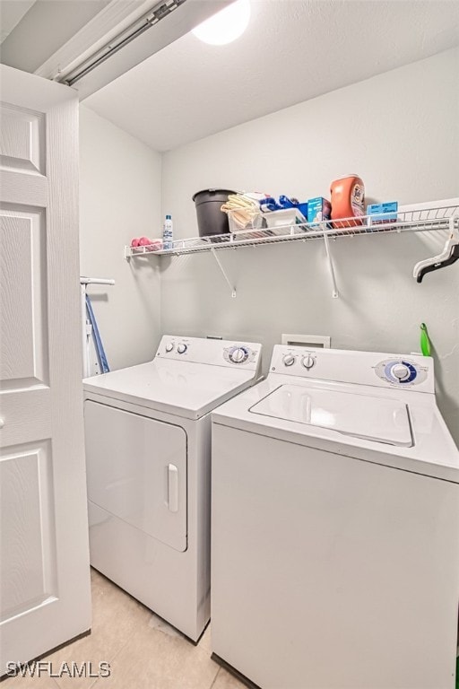 laundry room with washing machine and dryer