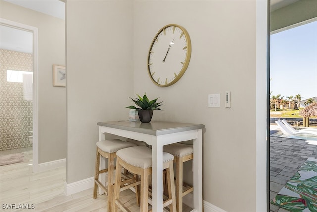 dining room with light wood-type flooring