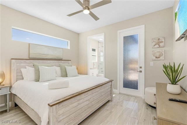 bedroom featuring ensuite bathroom, ceiling fan, and light wood-type flooring