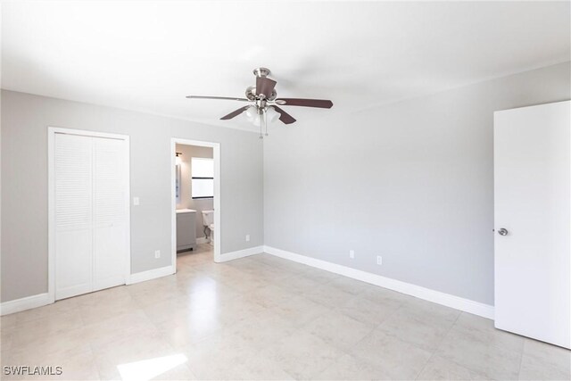 118 SW 13th St, Cape Coral, FL 33991 - unfurnished bedroom with a closet, ensuite bathroom, and ceiling fan