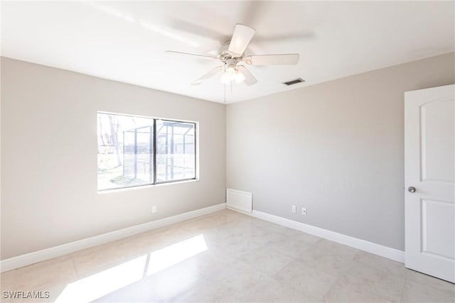 spare room featuring ceiling fan