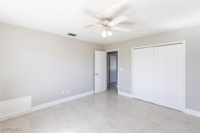 unfurnished bedroom featuring a closet and ceiling fan