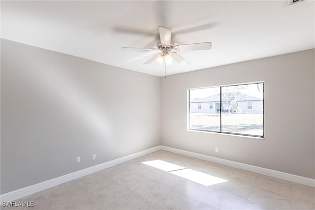 spare room featuring ceiling fan