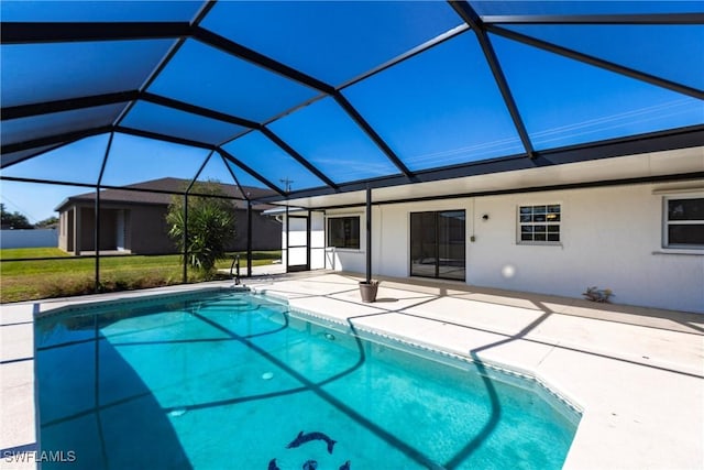 view of pool with a lanai and a patio