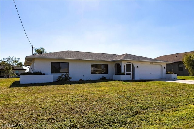 ranch-style house with a garage and a front lawn