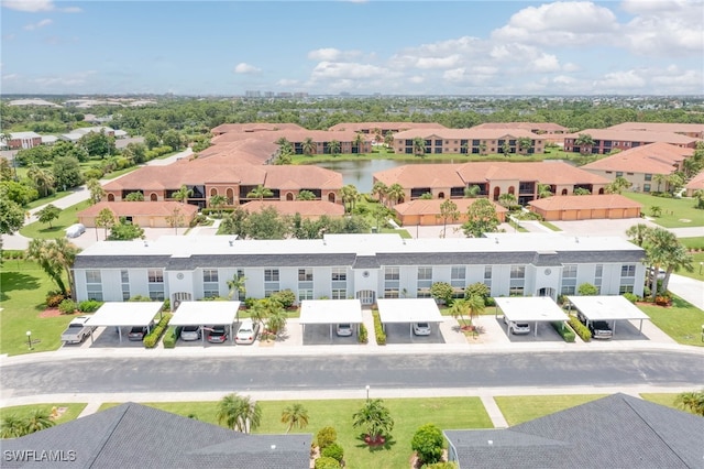 drone / aerial view with a water view