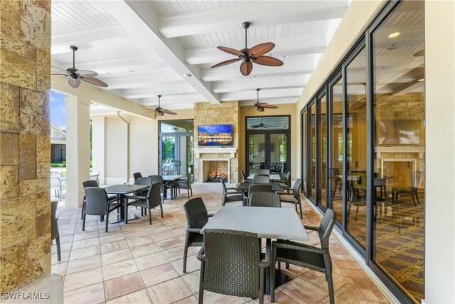 7045 Live Oak Dr, Naples, FL 34114 - view of patio featuring outdoor dining area, a ceiling fan, and french doors