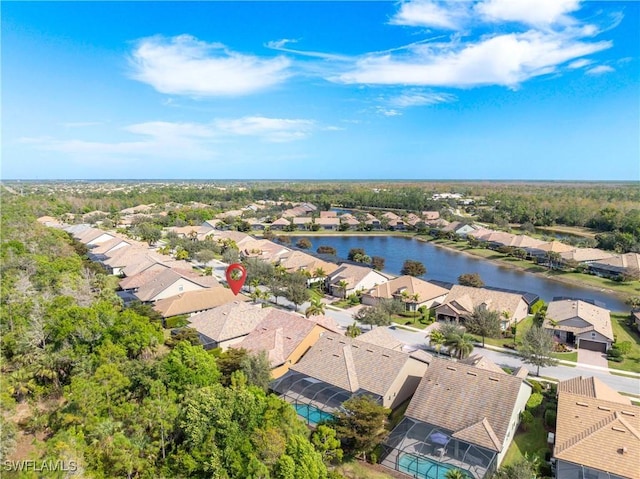 drone / aerial view with a water view