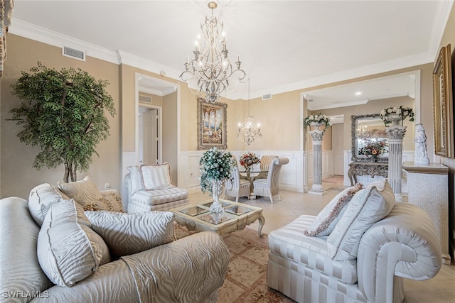 living room featuring an inviting chandelier, crown molding, and light tile patterned floors