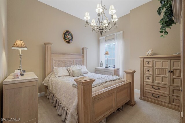 bedroom with light colored carpet and a chandelier