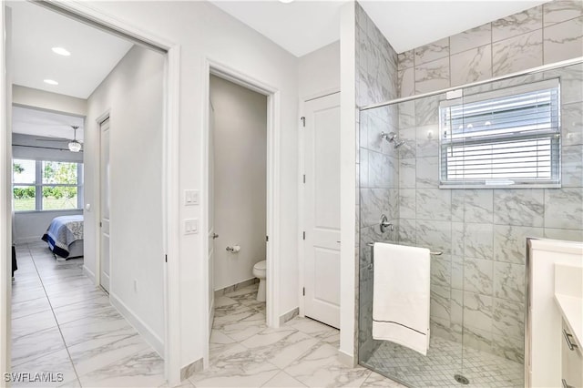 bathroom with an enclosed shower and toilet