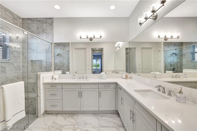 bathroom featuring walk in shower and vanity