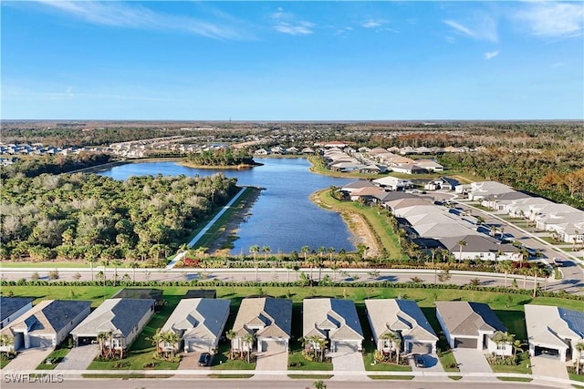 drone / aerial view with a water view