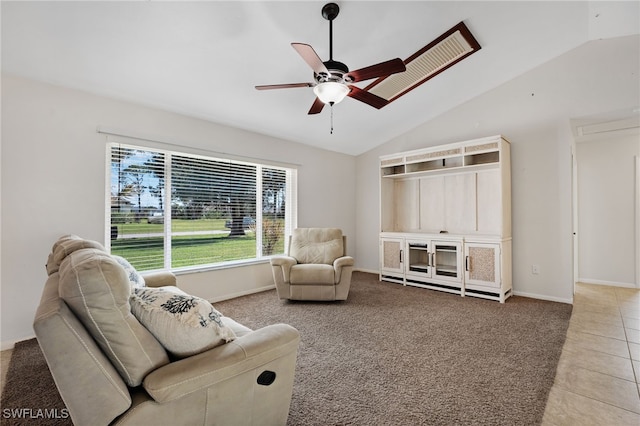 tiled living room featuring lofted ceiling and ceiling fan