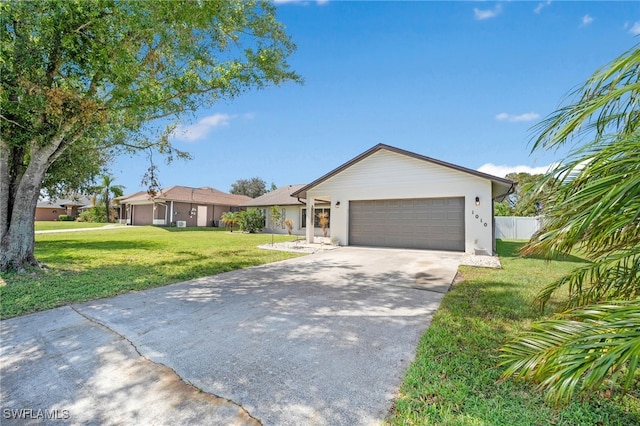 single story home with a garage and a front yard