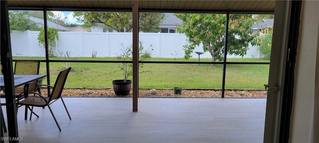 unfurnished sunroom with a healthy amount of sunlight