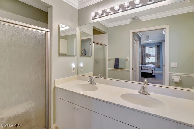 bathroom featuring vanity, crown molding, ceiling fan, and walk in shower