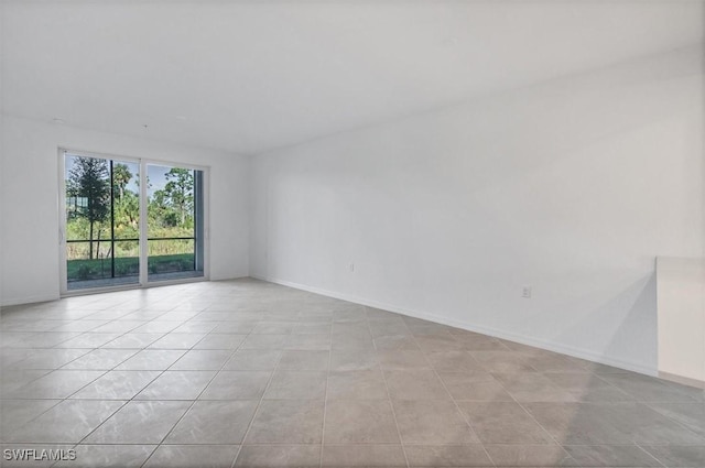 view of tiled spare room