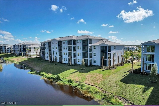 view of building exterior with a water view