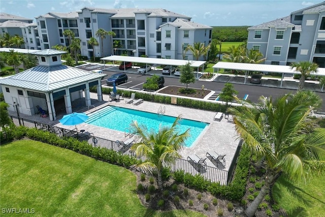 view of swimming pool with a patio, a gazebo, and a lawn