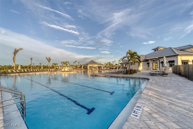 view of pool featuring a patio