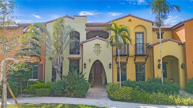 9078 Albion Ln S Unit 6603, Naples, FL 34113 - mediterranean / spanish home with stucco siding, a balcony, and a tile roof