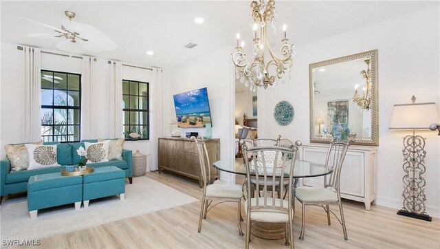 9078 Albion Ln S Unit 6603, Naples, FL 34113 - dining area with wood finished floors, a chandelier, and recessed lighting