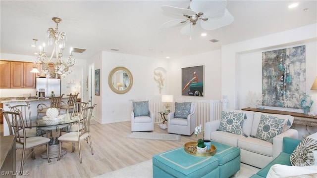 9078 Albion Ln S Unit 6603, Naples, FL 34113 - living room with light wood finished floors, ceiling fan, recessed lighting, a chandelier, and baseboards