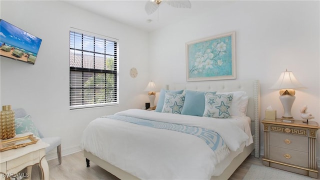 9078 Albion Ln S Unit 6603, Naples, FL 34113 - bedroom featuring wood finished floors, baseboards, and ceiling fan