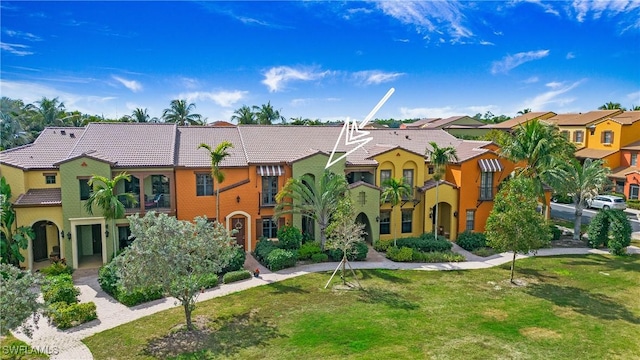 9078 Albion Ln S Unit 6603, Naples, FL 34113 - view of front of house featuring a tile roof, a residential view, a front yard, and stucco siding