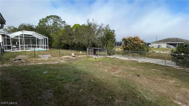 view of yard featuring a lanai