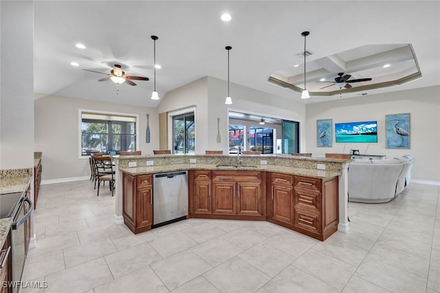 kitchen with sink, light stone counters, hanging light fixtures, dishwasher, and a kitchen island with sink