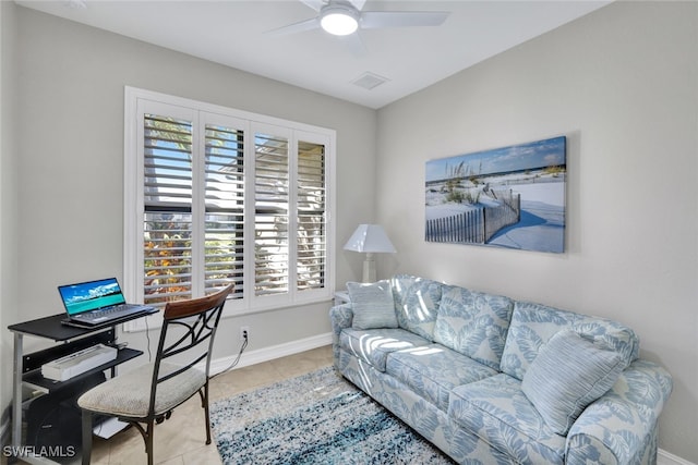 office area featuring light tile patterned flooring and ceiling fan