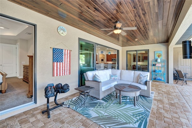 view of patio / terrace featuring an outdoor living space and ceiling fan