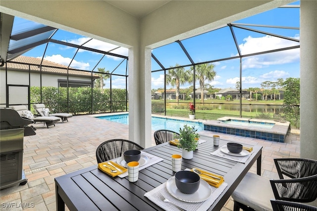 view of patio / terrace with a lanai, an outdoor pool, and an in ground hot tub