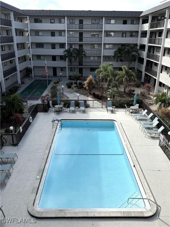 view of swimming pool featuring a patio