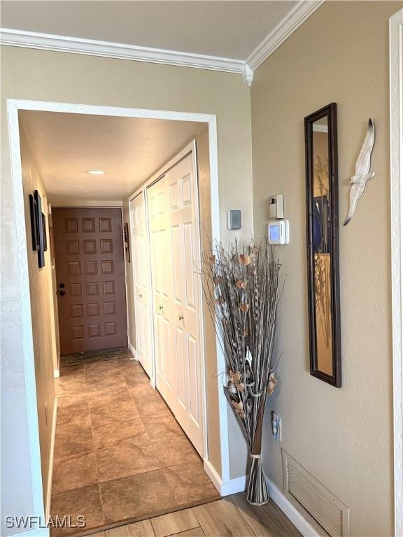 hallway with crown molding