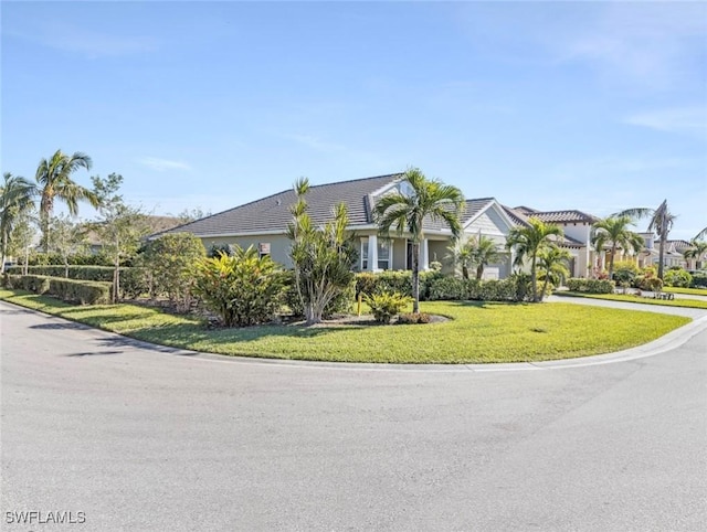 view of front of home with a front lawn