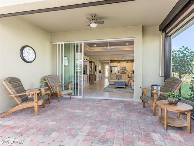 view of patio with ceiling fan